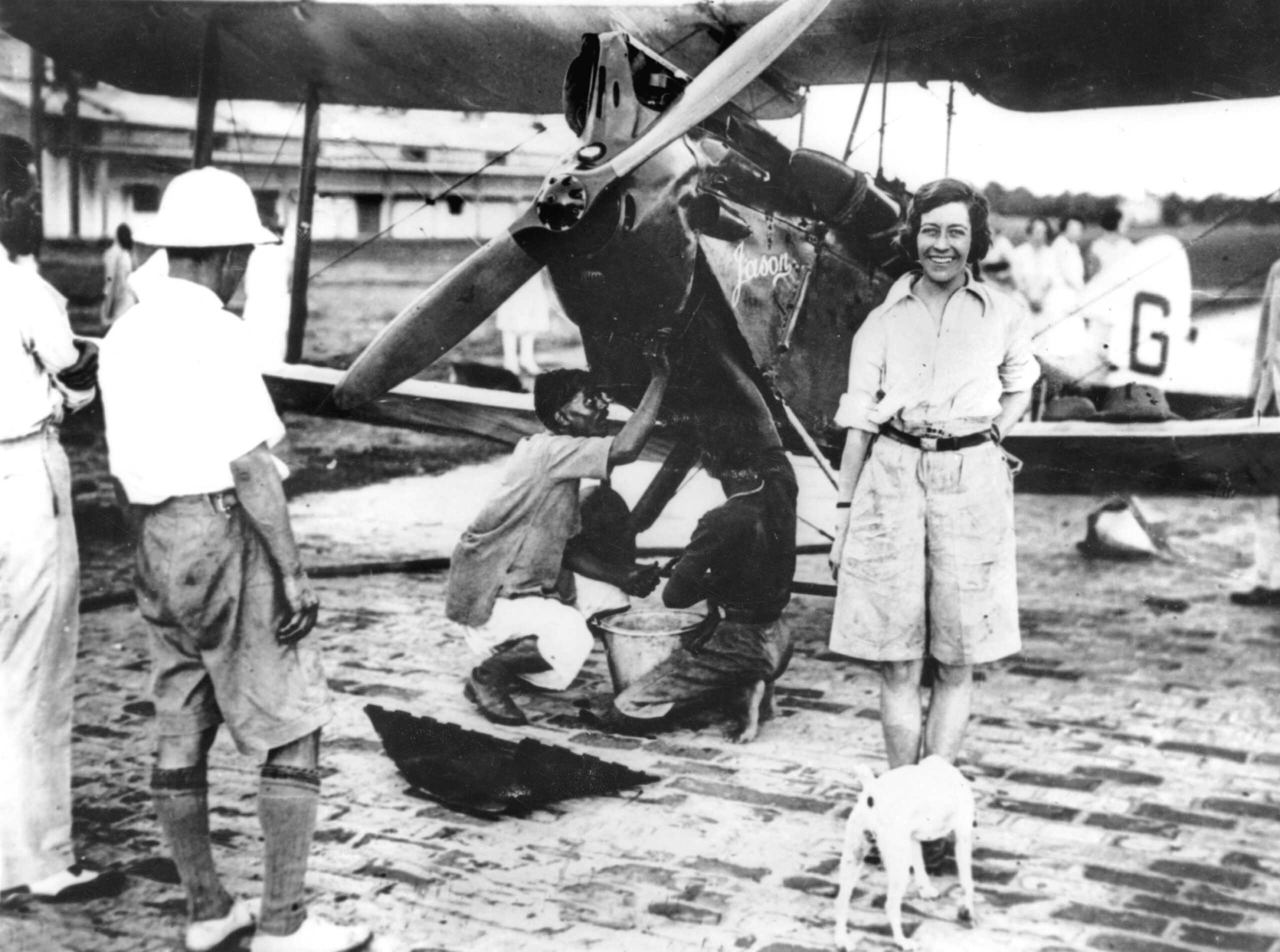 Members of the Dum-Dum Flying Club service Jason's engine